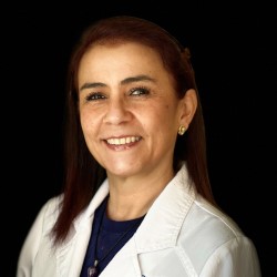 Portrait of Dr. Maria Del Pilar Avellaneda, a dentist with American Pediatric Dental Group in Pembroke Pines and Plantation, FL